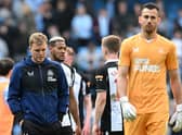 Newcastle United's English head coach Eddie Howe (L) and Newcastle United's Slovakian goalkeeper Martin Dubravka (R) leave the pitch after the English Premier League football match between Manchester City and Newcastle United at the Etihad Stadium in Manchester, north west England, on May 8, 2022. (Photo by PAUL ELLIS/AFP via Getty Images)