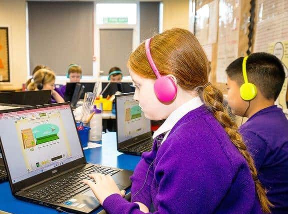 Pupils using Daisy Education software.
