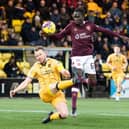 Livingston's Nicky Devlin stops Hearts' Garang Kuol during the 0-0 draw in West Lothian.