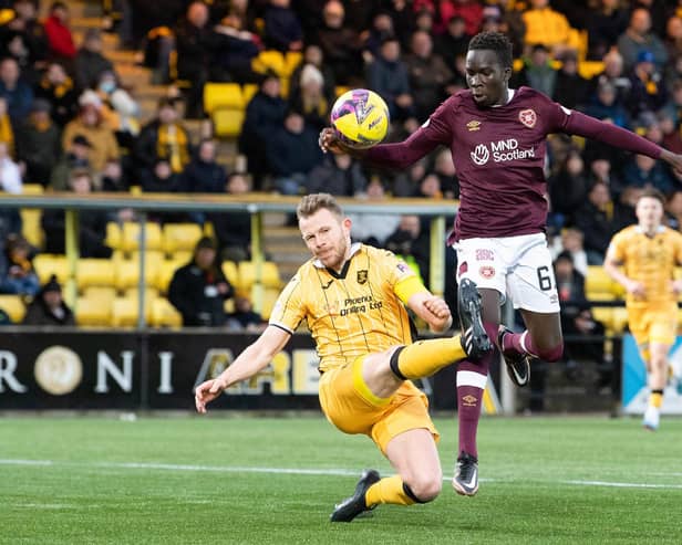 Livingston's Nicky Devlin stops Hearts' Garang Kuol during the 0-0 draw in West Lothian.