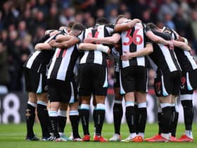 Newcastle United players huddle ahead of the Premier League match between Crystal Palace and Newcastle United at Selhurst Park on October 23, 2021 in London, England.