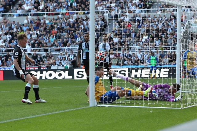 Mohamed Elyounoussi of Southampton scores their sides first goal past Martin Dubravka of Newcastle United during the Premier League match between Newcastle United and Southampton at St. James Park on August 28, 2021 in Newcastle upon Tyne, England.