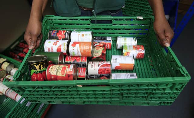 File photo dated 26/04/16 of stocks of food at the Trussell Trust Foodbank. A record near-three million emergency food parcels have been handed out at food banks in the year to March, with the number provided for children topping a million for the first time. The figures from the Trussell Trust charity represent a 37% increase compared to the previous year. Issue date: Wednesday April 26, 2023.