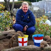 Drusillas Park’s Gemma Romanis with the 'mystic meerkats'.