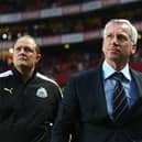Then-Newcastle United manager Alan Pardew, flanked by goalkeeping coach Andy Woodman, at the Estadio da Luz in April 2013.