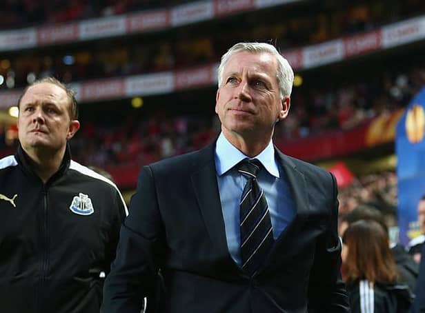 <p>Then-Newcastle United manager Alan Pardew, flanked by goalkeeping coach Andy Woodman, at the Estadio da Luz in April 2013.</p>
