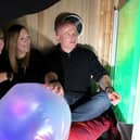 A Scotswood Village Nursery pupil joined in the sensory room by (L-R) nursery teachers Jen Rodden and Caroline Duncan and NTWDC Director, Lee McGray.