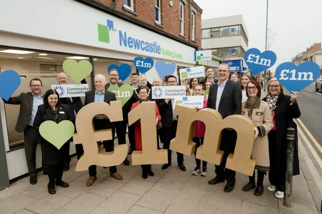 Newcastle Building Society’s chief executive officer, Andrew Haigh, and its Hartlepool branch manager, Carrieanne Wilford, celebrate the Society’s latest donation alongside Society colleagues and representatives from the Community Foundation Tyne & Wear and Northumberland.