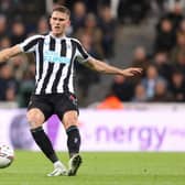 Sven Botman of Newcastle United passes the ball during the Premier League match between Newcastle United and Everton FC at St. James Park on October 19, 2022 in Newcastle upon Tyne, England. (Photo by George Wood/Getty Images)