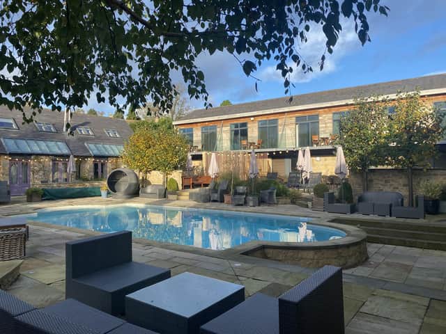 The outdoor heated swimming pool has pretty terrace surroundings. Image: Feversham Arms