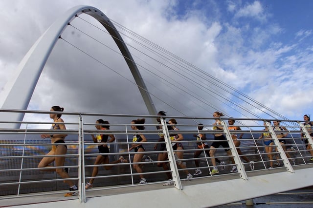 Here is a fantastic image from 2001, when the Women's Elite Race crossed the Millennium Bridge ahead of the Great North Run.
