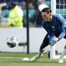 PNE 'keeper Freddie Woodman warms up before the game against Watford.