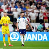 England's John Stones, goalkeeper Jordan Pickford and Declan Rice during the FIFA World Cup Quarter-Final match at the Al Bayt Stadium in Al Khor, Qatar. Picture: Nick Potts/PA Wire.