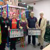 (from left) Barry Theakston, Lucy Bourner, Monda Bardha, Caroline Todd and Gary Todd of the King's Church food bank team with Kate Culverhouse of the Banks Group