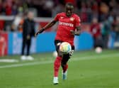 Moussa Diaby of Leverkusen runs with the ball during the Bundesliga match between Bayer 04 Leverkusen and 1. FC Union Berlin at BayArena on November 06, 2022 in Leverkusen, Germany. (Photo by Lars Baron/Getty Images)