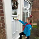 Beaver Scout delivers Christmas card