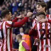 Sander Berge of Sheffield United (R) celebrates after scoring the opening goal against Swansea City at Bramall Lane: Andrew Yates / Sportimage