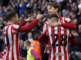 Sander Berge of Sheffield United (R) celebrates after scoring the opening goal against Swansea City at Bramall Lane: Andrew Yates / Sportimage