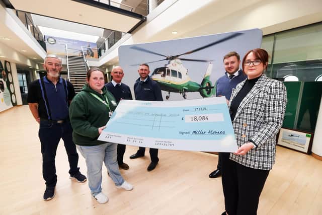 Member of GNASS receive a substantial cheque from Miller Homes Teesside.
