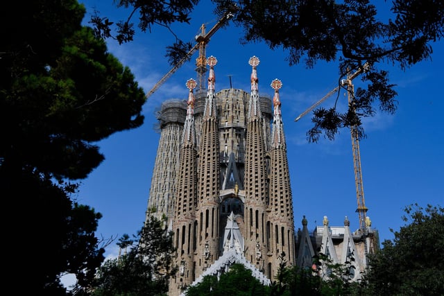 With amazing food, great coastlines, fantastic buildings and fascinating history, there is something for everyone in Barcelona. Flights start from £79. (Photo by PAU BARRENA/AFP via Getty Images)