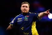 Luke Littler celebrates after a match during the 2025 BetMGM Premier League earlier this month. Picture: Zac Goodwin/PA Wire