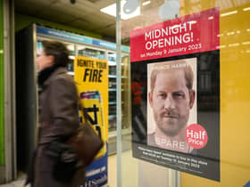 A poster advertising the launch of Prince Harry's memoir, Spare, on sale from today, is seen in a shop window (Picture: Leon Neal/Getty Images)