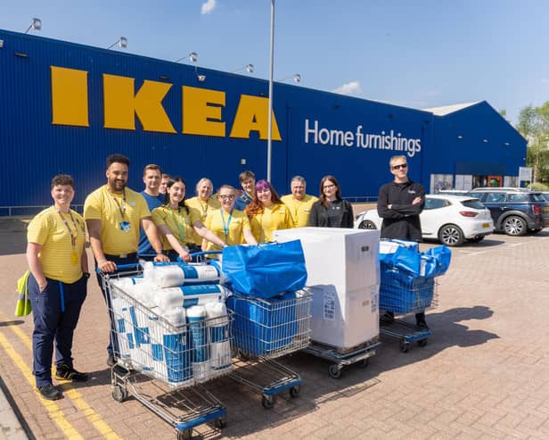 Co-workers from IKEA Gateshead alongside Thirteen Housing staff.