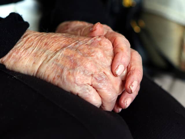 File photo dated 07/10/13 of the hands of an elderly woman at home. Councils are struggling to meet rising requests for adult social care support and some people are cutting back on their home care amid the cost-of-living crisis while "completely overwhelmed" family carers try to fill the gaps, the health watchdog has said. Issue date: Friday October 20, 2023.