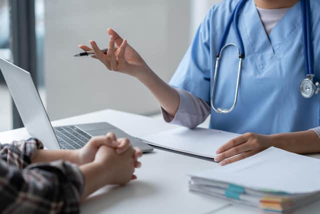 A stalker doctor installed a listening device next to another medic's bed in her home after their relationship broke down, jurors have heard.