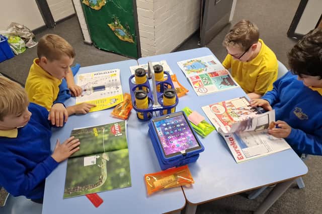 Pupils from Bridgewater Primary School enjoying the magazines.
