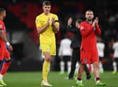 DIFFERING FORTUNES: Luke Shaw (right) had a stormer, Nick Pope (centre) a shocker