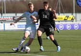 Charlie McArthur of Scotland vies with Dzenan Pecinovic of Germany during the UEFA Under17 European Championship Qualifier match between Germany U17 and Scotland U17 on March 26, 2022 in Glasgow, Scotland. (Photo by Ian MacNicol/Getty Images)