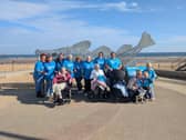 Residents and colleagues by the seaside