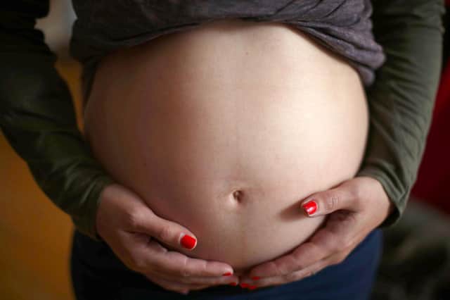 File photo dated 16/09/21 of a pregnant woman. Pregnant women with suspected pre-eclampsia will now be offered a test on the NHS to detect the condition. Issue date: Friday March 25, 2022.