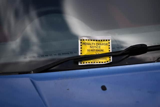 The top ten Newcastle roads where the most parking tickets were issued in 2022 (Photo by DANIEL LEAL/AFP via Getty Images)