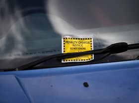 The top ten Newcastle roads where the most parking tickets were issued in 2022 (Photo by DANIEL LEAL/AFP via Getty Images)