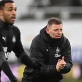 Newcastle  coach Graeme Jones reacts during the warm up before the Premier League match between Newcastle United and Crystal Palace at St. James Park on February 02, 2021 in Newcastle upon Tyne, England.