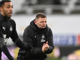 Newcastle  coach Graeme Jones reacts during the warm up before the Premier League match between Newcastle United and Crystal Palace at St. James Park on February 02, 2021 in Newcastle upon Tyne, England.