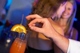   A woman has admitted spiking someone's drink with poison and could be facing prison.   