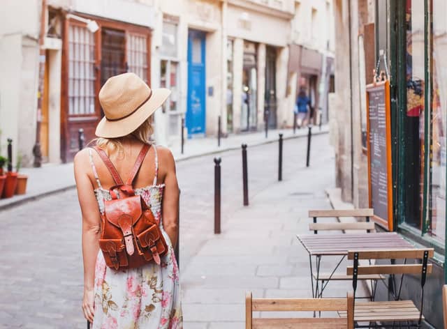 Seeing the sights on foot can help to cut your carbon footprint when travelling (photo: Adobe)