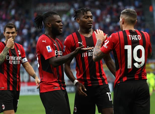 <p>MILAN, ITALY - SEPTEMBER 12: Rafael Leao (C) of AC Milan celebrates with his team-mates Theo Hernandez (R) and Franck Kessie (L) after scoring the opening goal during the Serie A match between AC Milan and SS Lazio at Stadio Giuseppe Meazza on September 12, 2021 in Milan, Italy. (Photo by Marco Luzzani/Getty Images)</p>