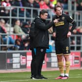 Sheffield United manager Paul Heckingbottom with midfielder Sander Berge: Simon Bellis / Sportimage