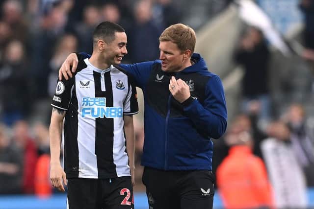 Newcastle United head coach Eddie Howe with goalscorer Miguel Almiron. (Photo by Stu Forster/Getty Images)