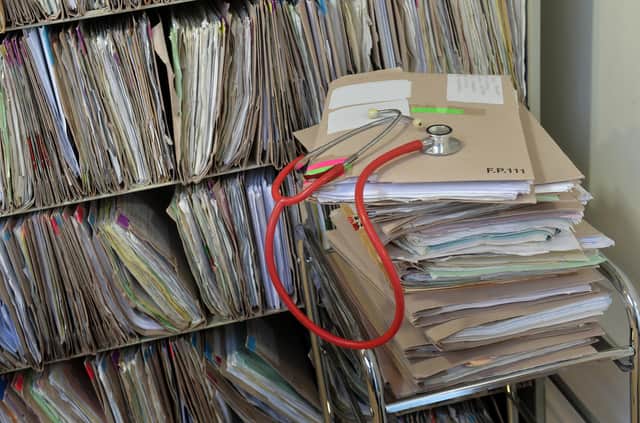 A stethoscope on top of patient's files at the Temple Fortune Health Centre GP Practice near Golders Green, London.