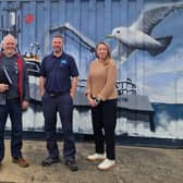 (L to R) New member Geoff Cowan BEM with NIFCA Chief Officer Mark Southerton and Chair Amelia Henderson.