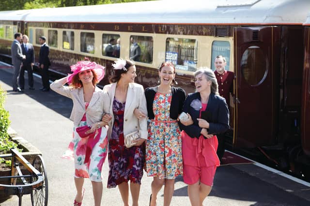 All aboard ... happy passengers prepare to board the Northern Belle