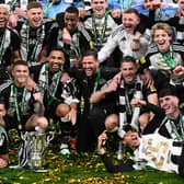 The Newcastle United squad following their historic Carabao Cup winning triumph over Liverpool.   (Photo by Stu Forster/Getty Images)