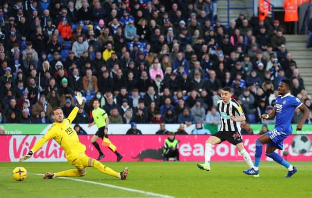 Miguel Almiron of Newcastle United scores the team's second goal past Danny Ward of Leicester City during the Premier League match between Leicester City and Newcastle United at The King Power Stadium on December 26, 2022 in Leicester, England. (Photo by Marc Atkins/Getty Images)