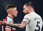 West Ham United's Scottish defender Harrison Ashby (L) clashes with Tottenham Hotspur's Danish midfielder Pierre-Emile Hojbjerg (R) during the English League Cup quarter-final football match between Tottenham Hotspur and West Ham United at Tottenham Hotspur Stadium in London, on December 22, 2021.(Photo by BEN STANSALL/AFP via Getty Images)