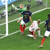 Any body part will do: Kylian Mbappe of France scores the team's second goal past Kasper Schmeichel of Denmark  (Picture: Tim Nwachukwu/Getty Images,)